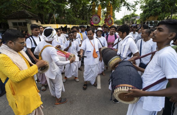 Hindu devotees takes part in Rath Yatra religious procession Guwahati, India on June 27, 2025. Rath