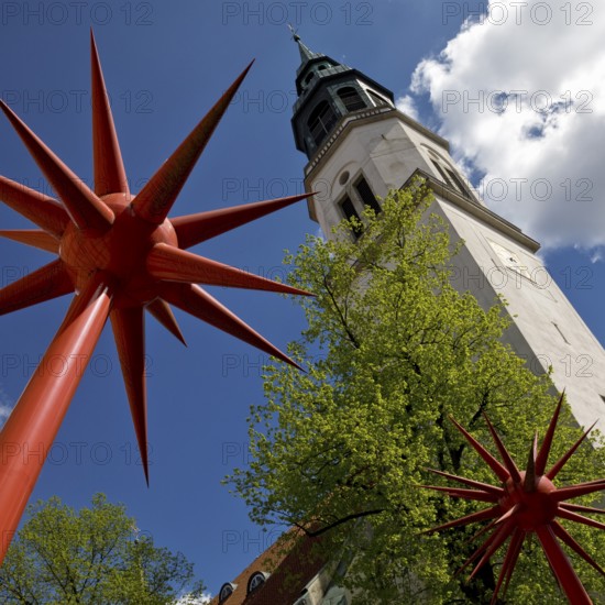 Artwork by Otto Piene entitled Fireworks for Celle in front of the tower of the town church in the