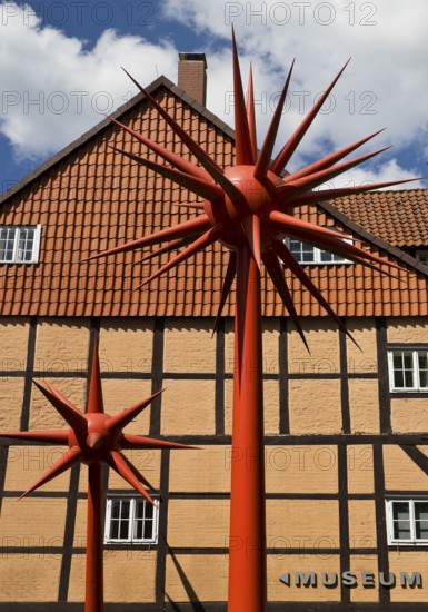 Artwork by Otto Piene entitled Fireworks for Celle in front of a half-timbered house in the