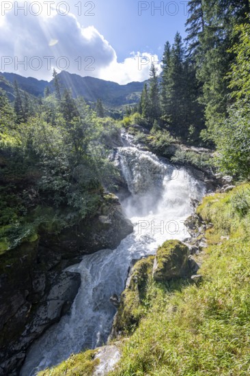 Waterfall on a roaring mountain stream, Seebach stream in the Burkhardklamm gorge, Ridnauntal