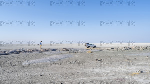 Vast white empty landscape on a salt pan, tourist and off-road vehicle, Kubu Island (Lekubu), Sowa