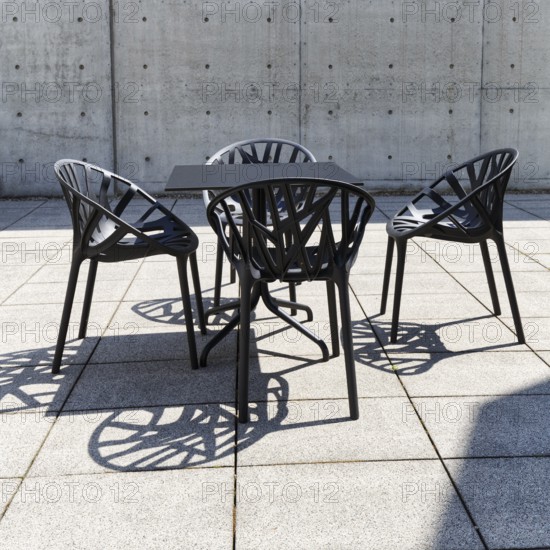 Seating area in the inner courtyard, black table and four plastic chairs, design, conference