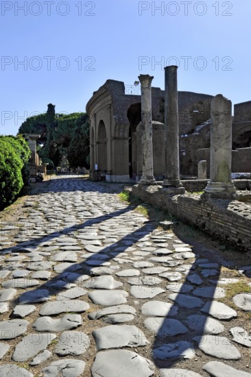 Ancient pavement of the main street Decumano Massimo, Roman theatre, columns, remains, ruins,