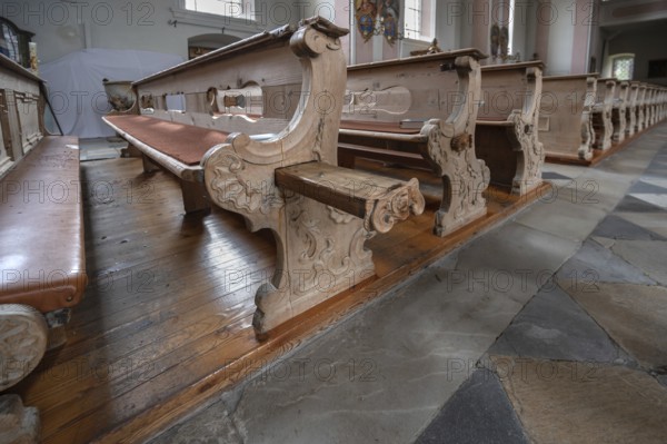 Pull-out emergency seats on the pews, Heilger Pankratius church, BahnstraÃŸe 1, Telfes im Stubai,
