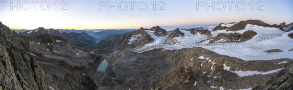 Panorama at sunrise, high mountain landscape, view of blue glacial lakes, mountain peaks