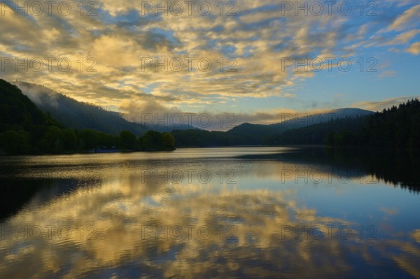 Reflection of clouds on a calm lake at dusk, summer, Rursee, Obersee, Rurberg, Simmerath, Eifel