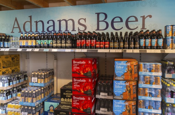 Adnams beer products on display inside brewery shop, Southwold, Suffolk, England, UK
