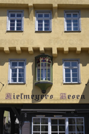 Detailed view of a historic half-timbered house and restaurant Kielmeyer's Besen in the old town of