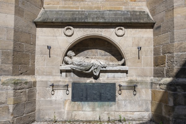 War memorial at the parish church of St Dionys, created in 1910 by Karl August Donndorf in the old