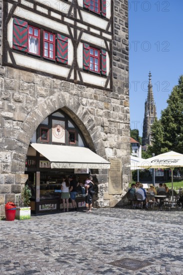 Ice cream parlour and outdoor catering at the Schelztorturm, historic half-timbered building, city