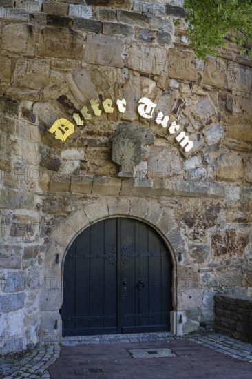 Wooden door, entrance to the thick tower with letters in Kurrent script, Esslingen am Neckar,