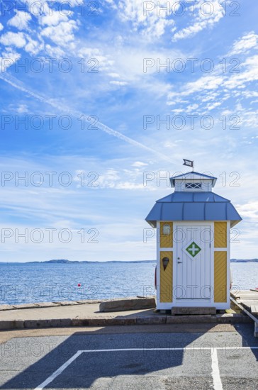 Wooden hut with first aid at the pier in Lysekil harbour, BohuslÃ¤n, VÃ¤stra Götalands lÃ¤n,