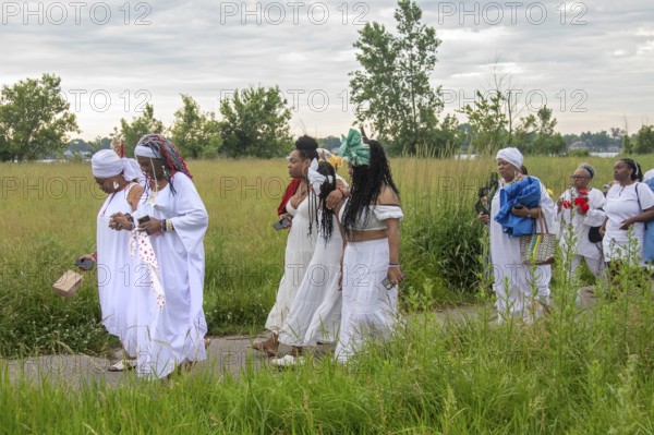 Detroit, Michigan - African-Americans gather on the banks of the Detroit River to commemorate