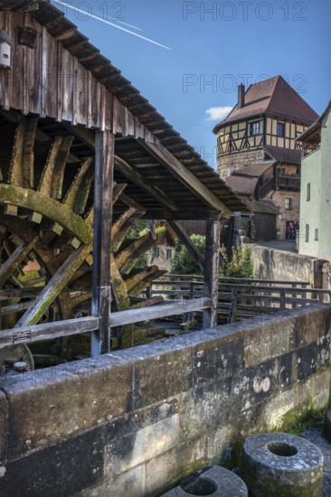 Waterwheel of the historic Schleifmühle, behind the Judenturm, built in 1430, former part of the