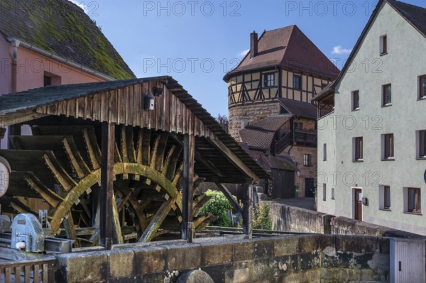 Waterwheel of the historic Schleifmühle, behind the Judenturm, former fortress tower, Höllgasse,