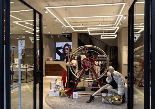 View from outside of a shop owned by the American clothing company GUESS, Noble Fashion Store, City