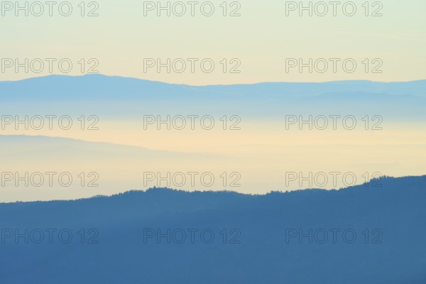 Wide mountain landscape, sunrise with soft shades of blue, view of the Rhine Valley, Hohneck, La
