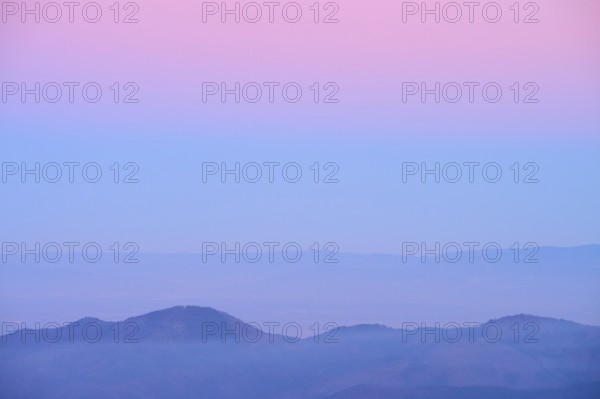 Mountain landscape with pastel-coloured sky at dusk, looking towards the Rhine Valley, Hohneck, La