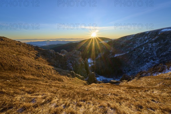 Strong sun rays over mountain landscape, clear blue and expanse, view of the Rhine Valley,
