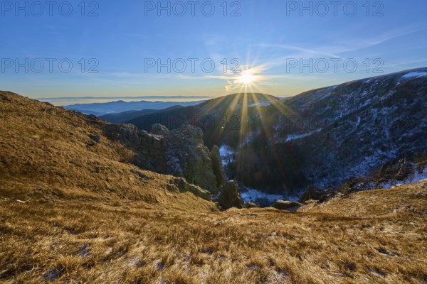 Intense sunshine over an extensive mountain range, clear and cool atmosphere, view of the Rhine