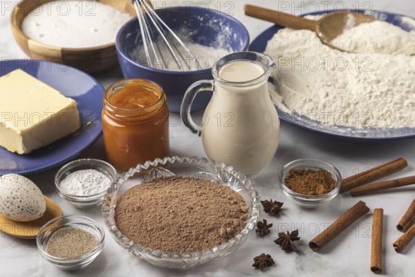 Baking ingredients such as flour, milk and spices are prepared for baking