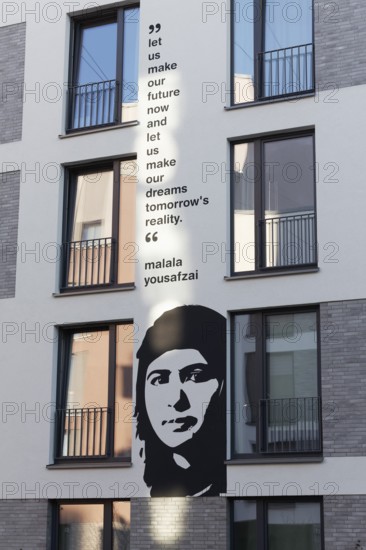 Malala Yousafzai, portrait mural and quote from the Nobel Peace Prize winner at a student
