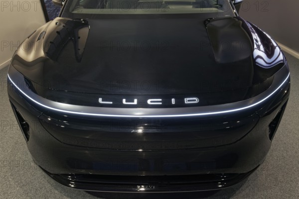 Lucid logo on Lucid Gravity electric SUV, showroom of the American brand for electric cars on the