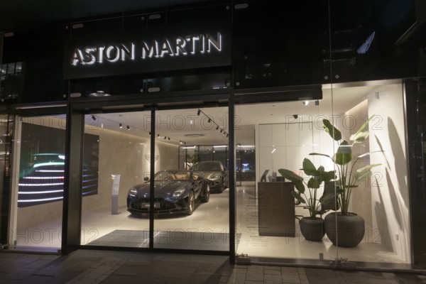 Aston Martin Düsseldorf, illuminated showroom with luxury sports car, Düsseldorf, North