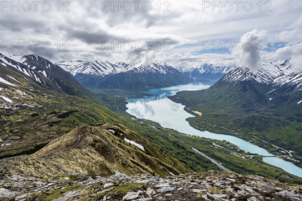 View of snowy mountains and turquoise lake Kenai Lake, Slaughter Ridge Trail, Cooper Landing, Kenai