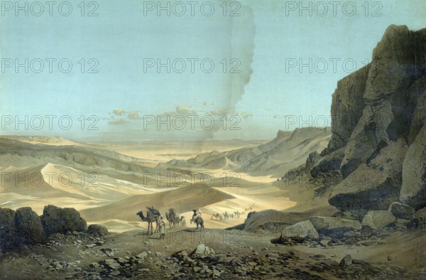 Camel caravan in the Sahara desert in Libya around 1890, school picture, authentic reproduction of