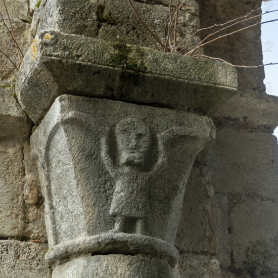 St Cyr and St Julitte's Church, roman church of Escurolles. Atlas sculpture. Allier department,