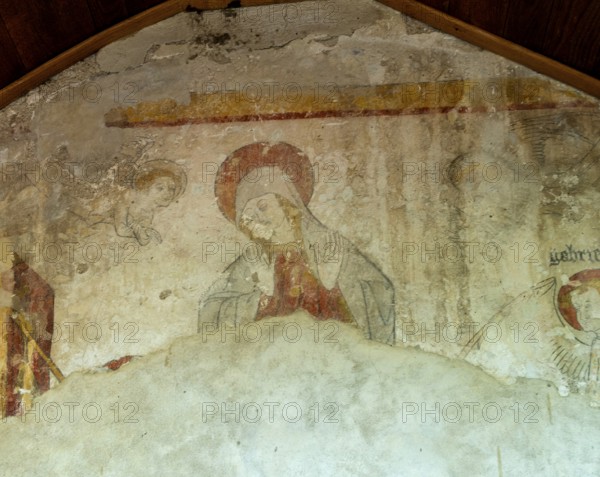 The Annunciation. Painted church St Aignan's, Church of Begues. Allier department. Auvergne Rhone