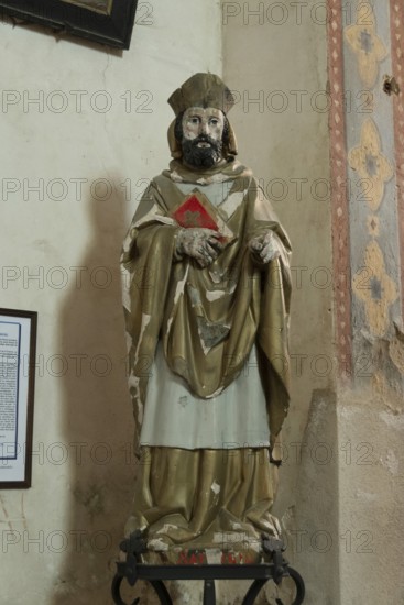 Saint Saturnin statue. Mazerier painted church. St Saturninus Church. Allier department, Auvergne