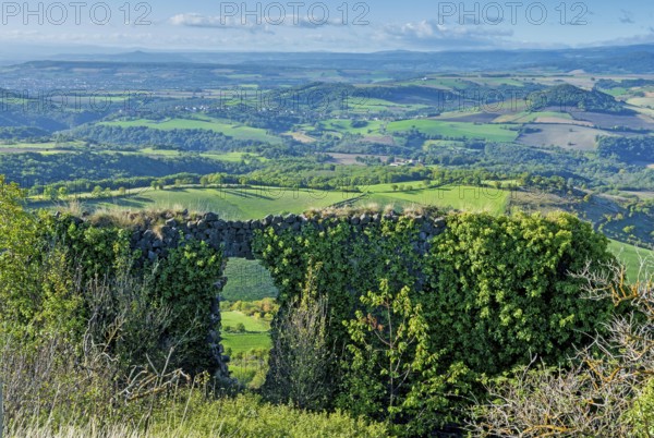 Ruins of medieval castle of Buron on Limagne plain. Puy de Dome. Auvergne Rhone Alpes. France