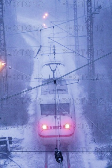 Winter weather, snowfall, ICE train, regional traffic, on the route east, in front of Essen main