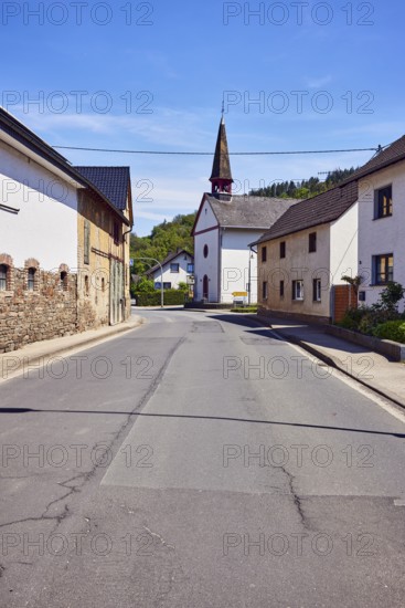 Church of St. Roch and Sebastian, general development, residential building, hill, forest, blue