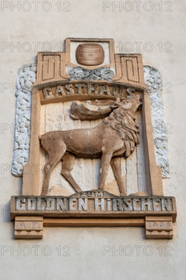 Relief of the Gasthaus Zum Goldenen Hirschen on a house façade, Fürth, Middle Franconia, Bavaria,