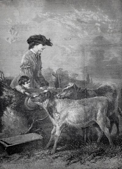 In the pasture, woman with her child walking in the countryside have passed by a pasture, curious