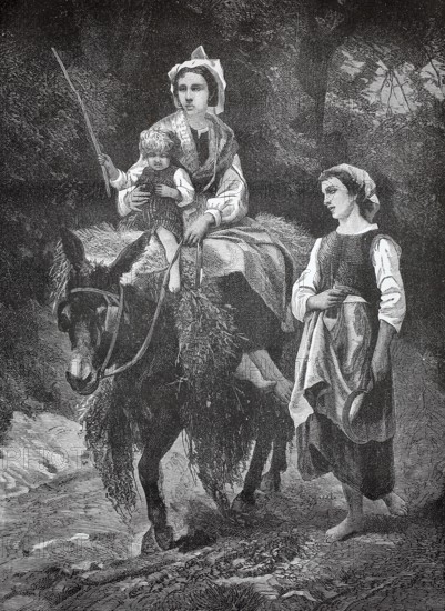Home from working in the fields, two woman and a child come back from the field with the donkey, a