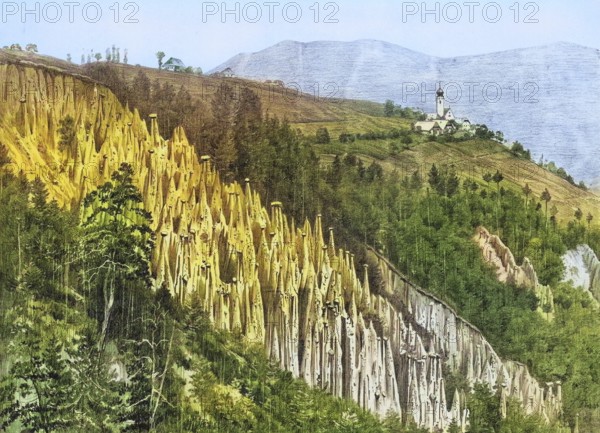 Earth pyramids on Ritten near Bolzano, South Tyrol, Italy, authentic reproduction of a school