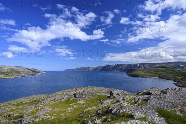 Clear blue sky over rough coastal landscape on Syltefjord with sea, wide landscape with sea and