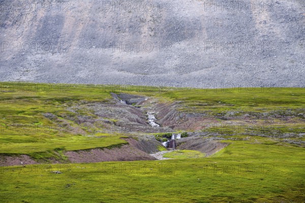 On the slope of a massive granite rock with rugged boulders at Austertanaveien 890 in the
