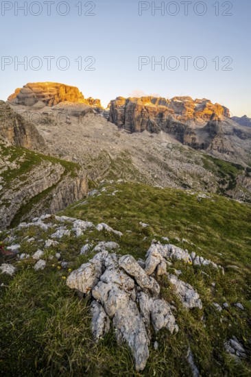 View of rocky mountain peaks of the Brenta Mountains at sunset, Alpenglühen, mountain landscape on