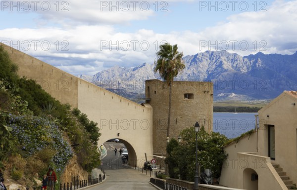 Calvi citadel, with the mountains of the Balagne region in the Haute-Corse department, Corsica,
