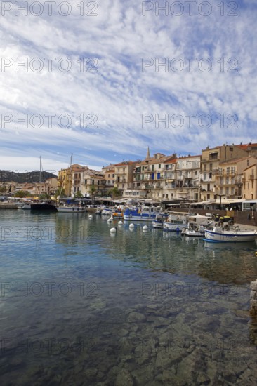 Colourful boats and restaurants in the port of Calvi, Balagne, Haute-Corse department, Corsica,