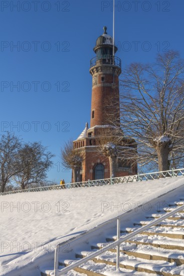 Holtenau lighthouse at the entrance of the Kiel Canal in winter, west bank of the Kiel Fjord,