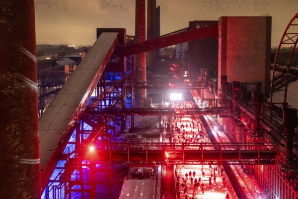Ice rink at the Zollverein coking plant, ice skating with music and many lighting effects, Essen,