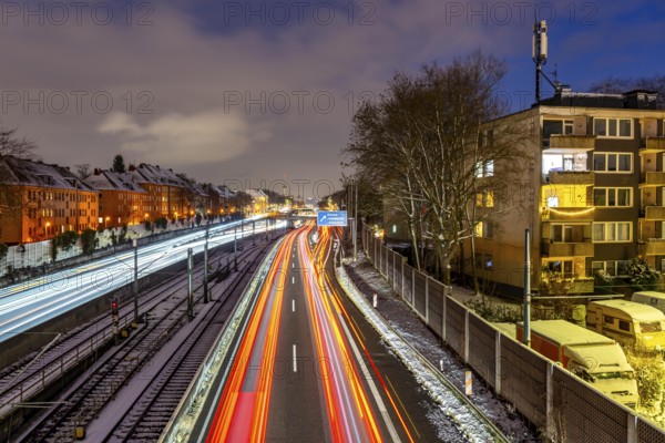 Autobahn A40, Ruhrschnellweg, near Essen at the Frohnhausen junction, evening traffic in winter,