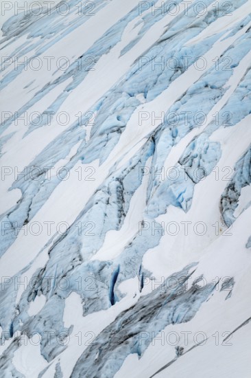 Blue rugged glacier ice with crevasses and snow, detail, Exit Glacier, Kenai Peninsula, Alaska, USA