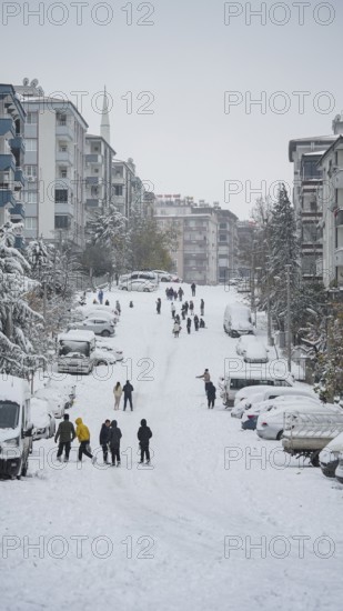 In Gaziantep, Turkey, on December 31, 2025, children and families enjoy winter activities as they